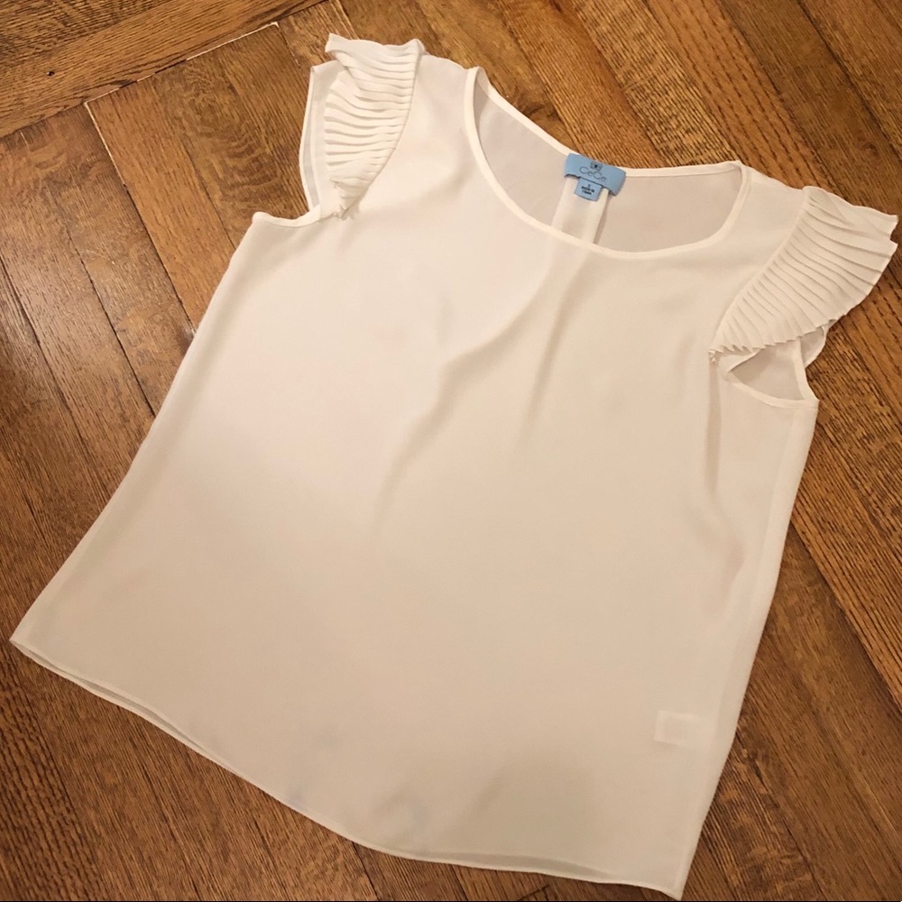 White flutter sleeve blouse